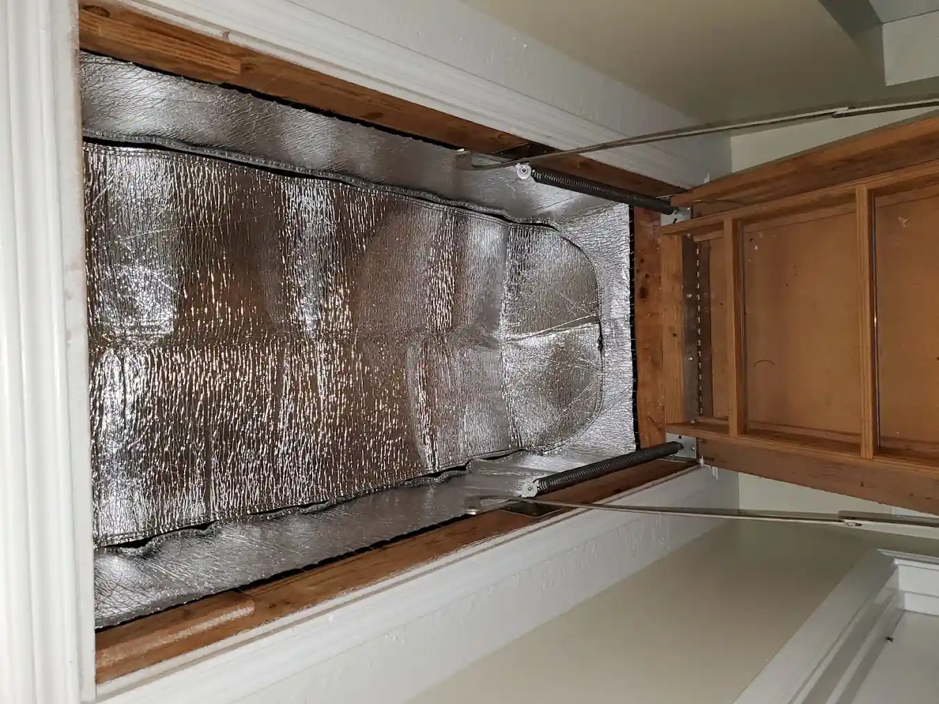 Air sealing attic penetrations in an Angleton TX home