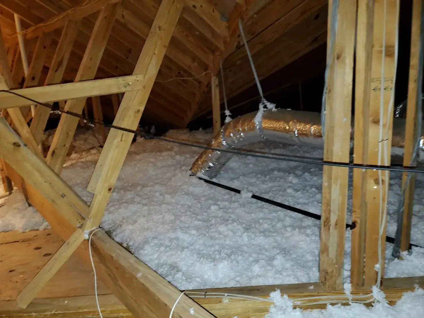 Blown-in attic top-off insulation in an Angleton TX home