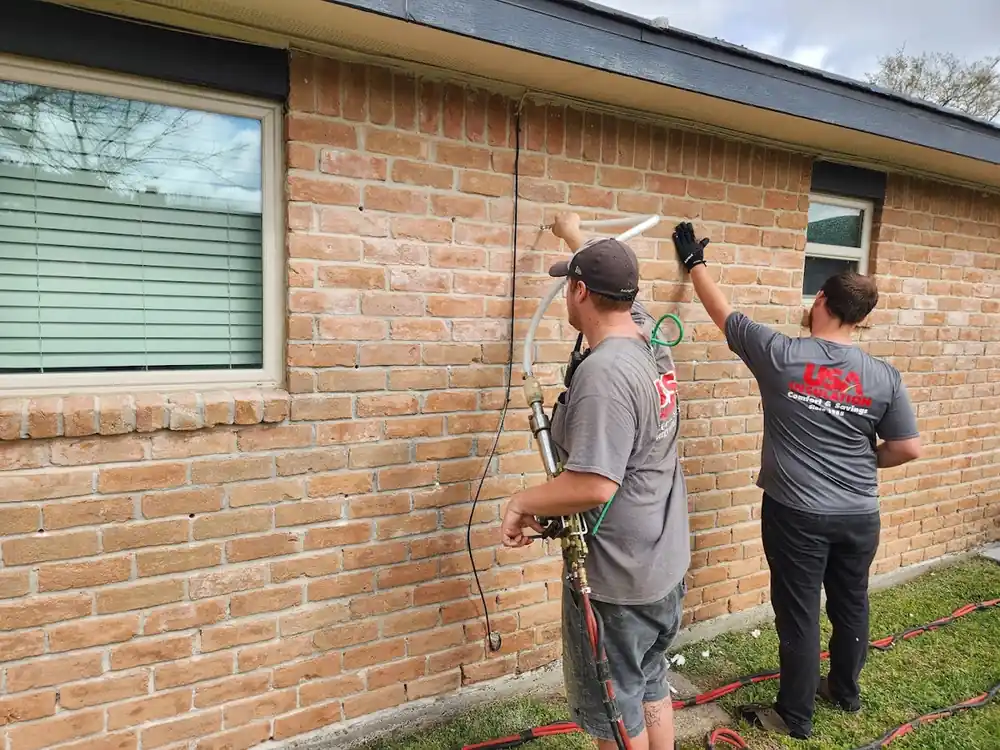 Injection foam wall access on a residential exterior