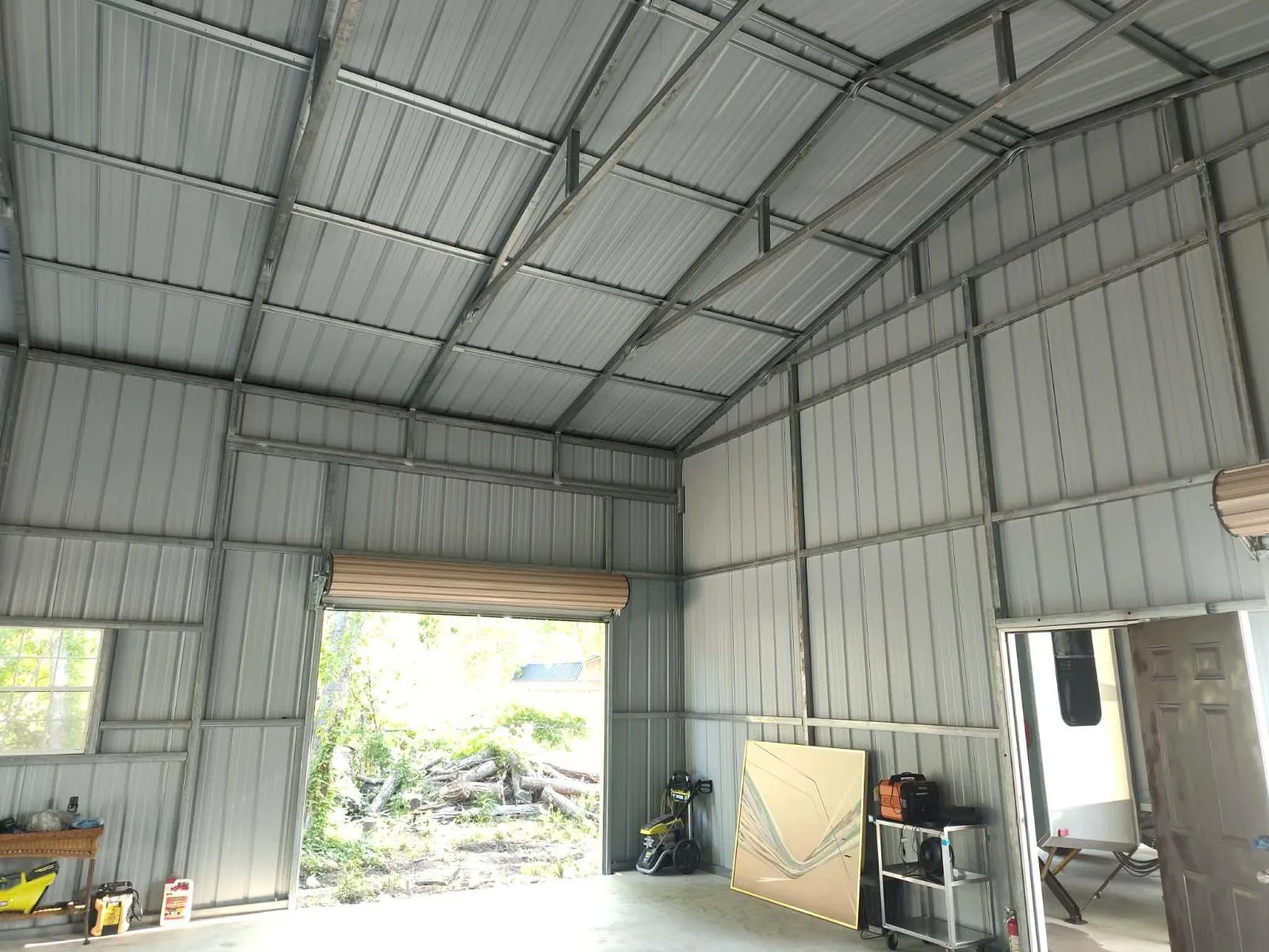 Spray foam insulation applied inside a commercial metal building in Houston