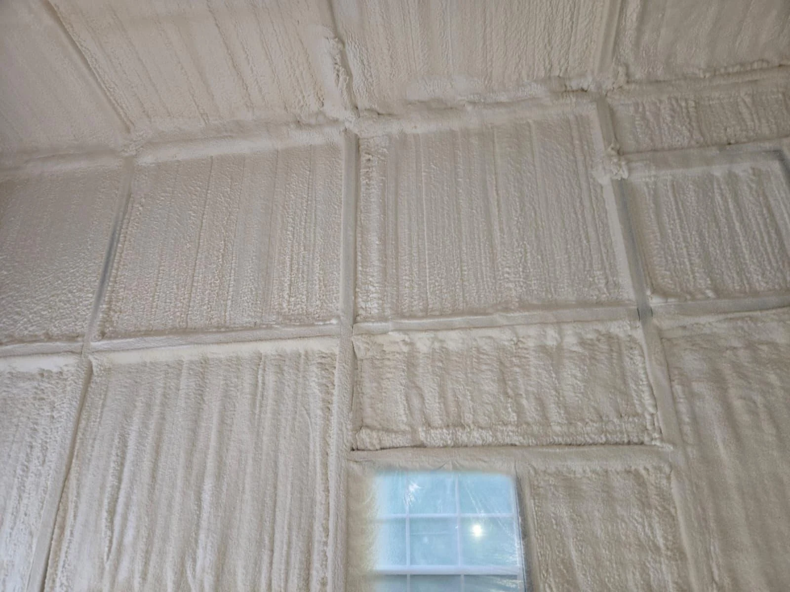 Pasadena metal building roof deck after closed-cell spray foam