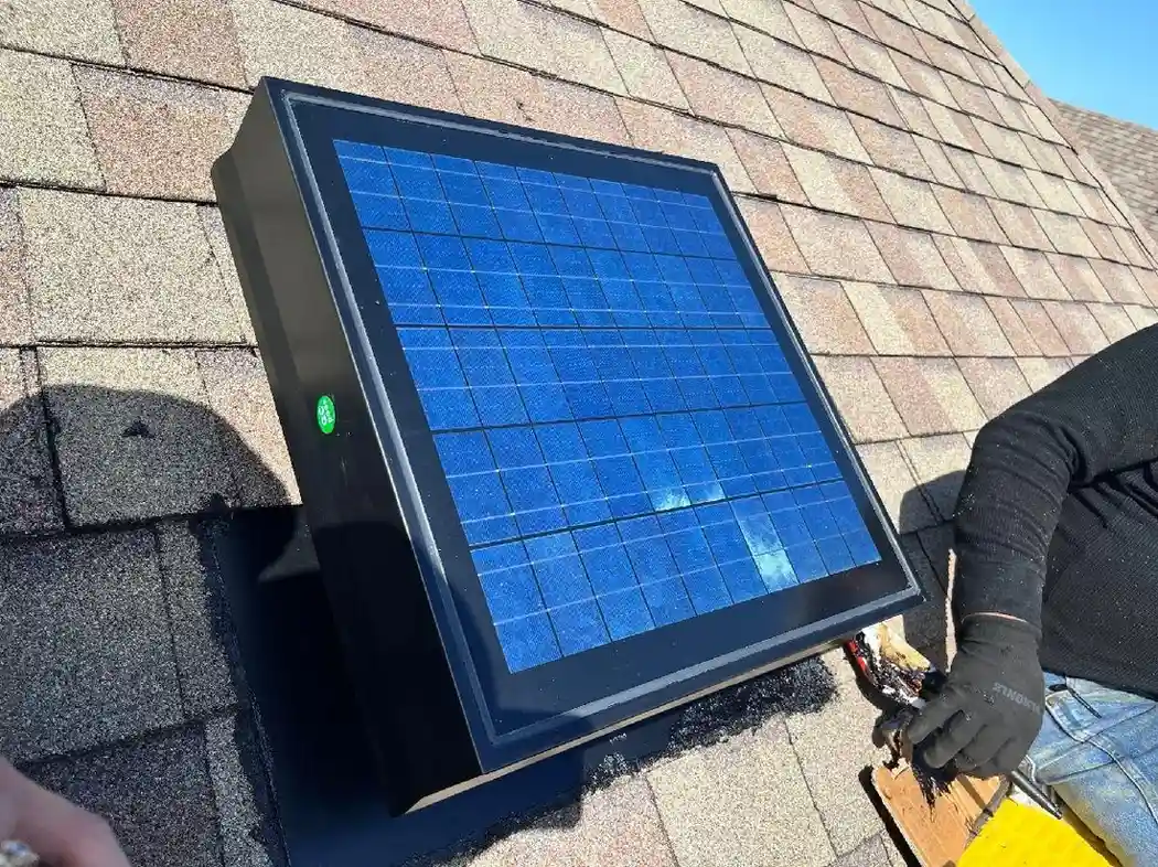 Solar powered attic ventilation fan on an Angleton TX roof